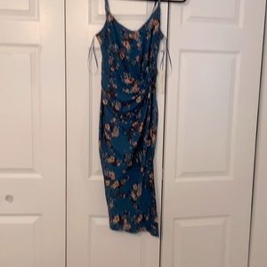 Mid calf Green flower dress cinched waist.